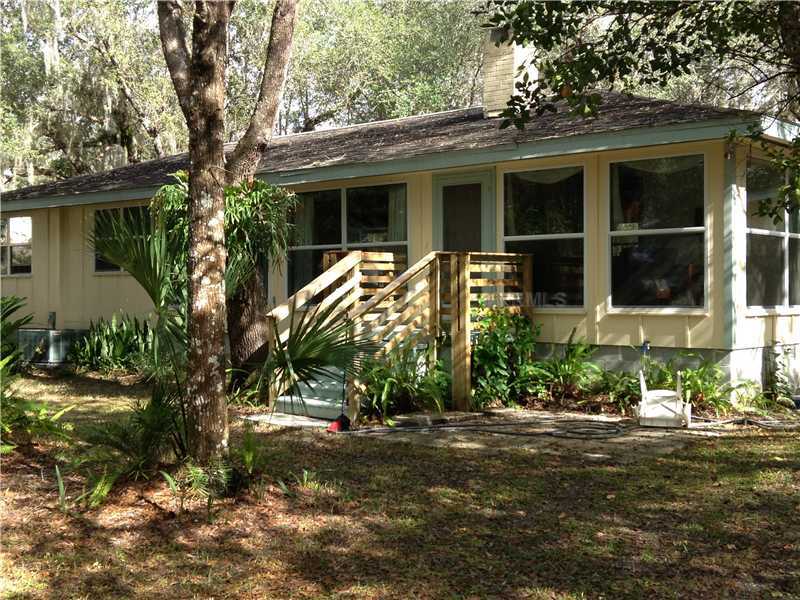 Property Photo:  8597 SW Riverside Drive  FL 34269 