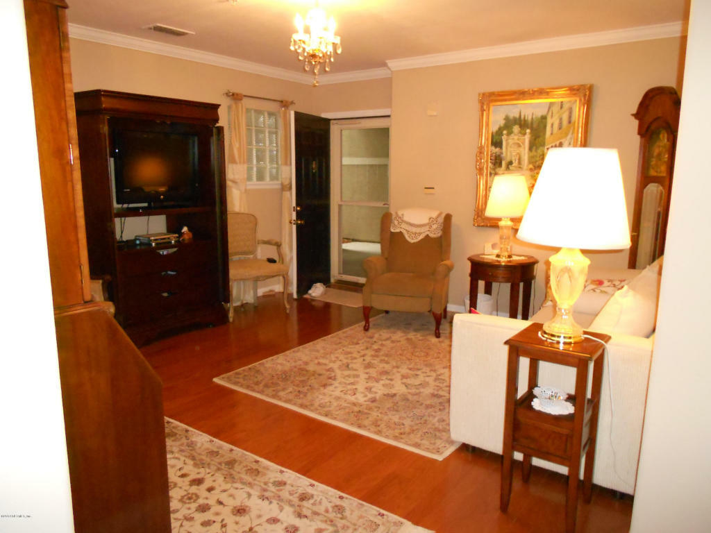 Property Photo:  1655 The Greens Way 3013  FL  