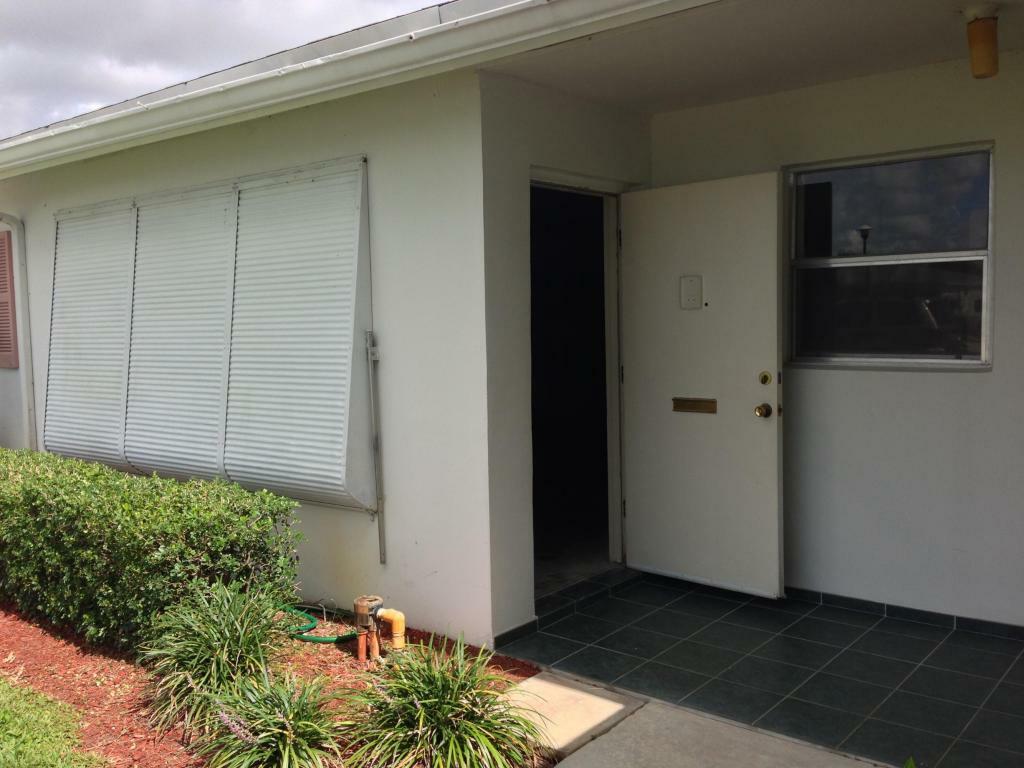 Property Photo:  617 High Point Drive Apt C  FL 33445 