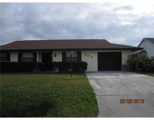 Property Photo:  846 SE Carnival  FL 34983 