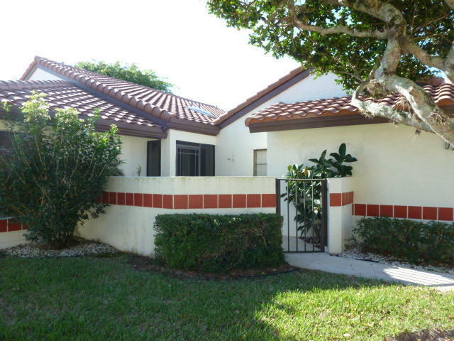 Property Photo:  10974 Dolphin Palm Court A  FL 33437 