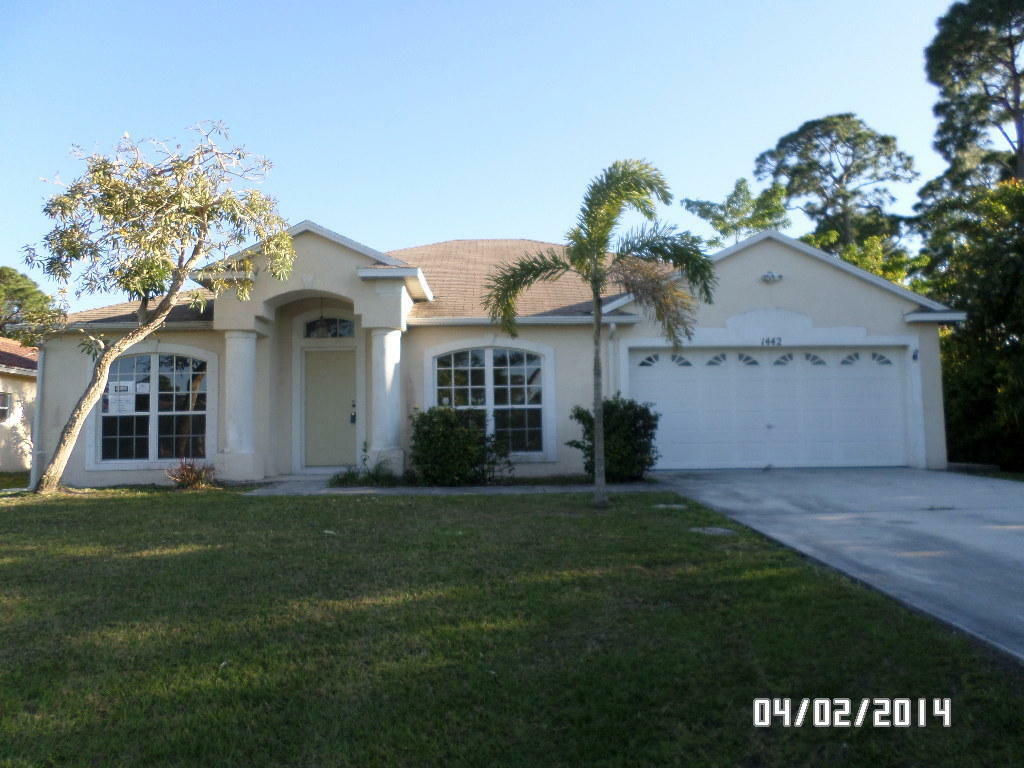 Property Photo:  1442 SW Santiago Avenue  FL 34953 