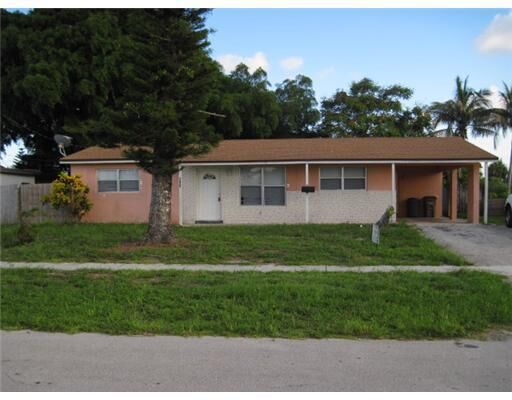 Property Photo:  390 NW 39th Street  FL 33064 