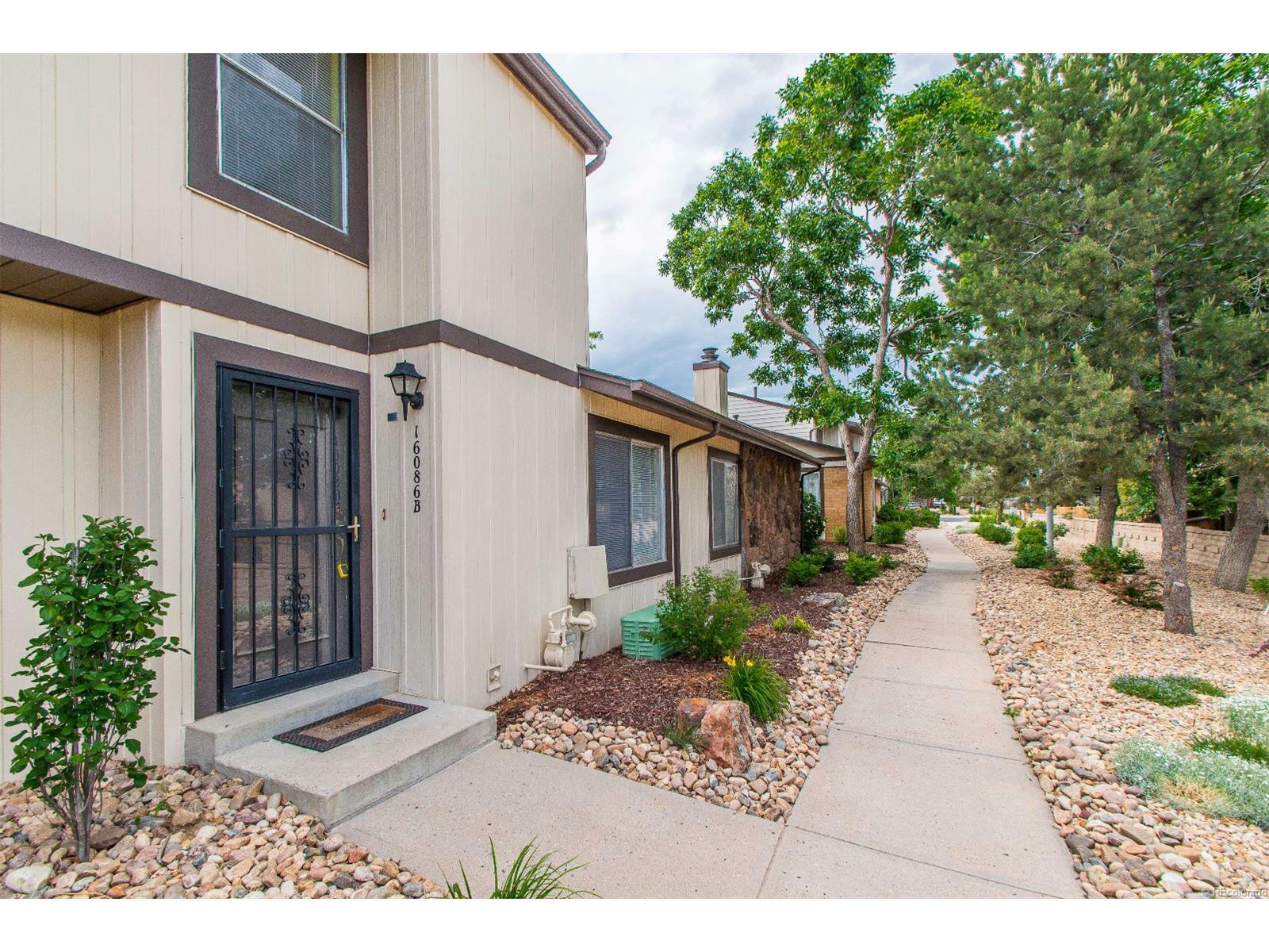 Property Photo:  16086 East Ithaca Place Unit B  CO 80013 