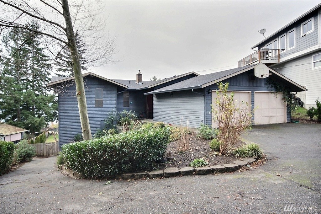 Property Photo:  115 S 214th St  WA 98198 