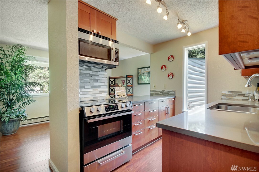 Property Photo: 9721 Bristonwood Drive W 11-D WA 98467
