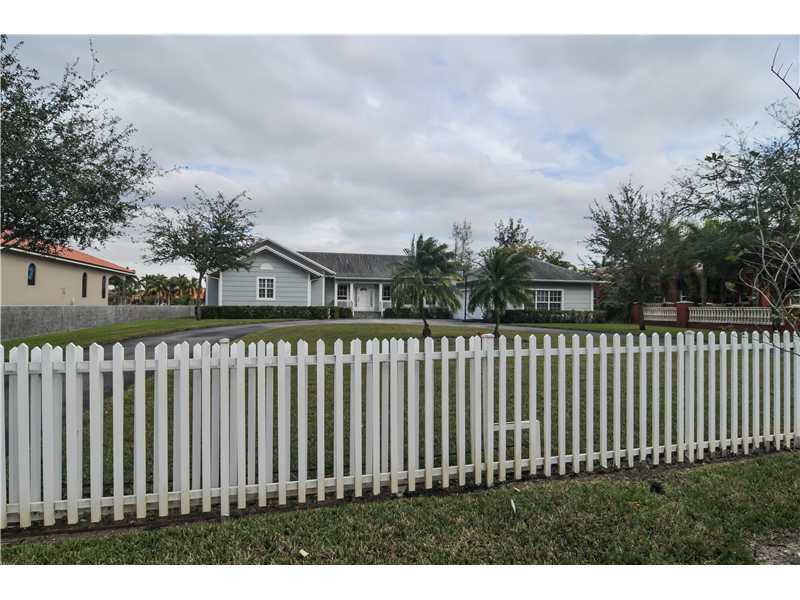 Property Photo: 103 NW 128 Av FL 33182
