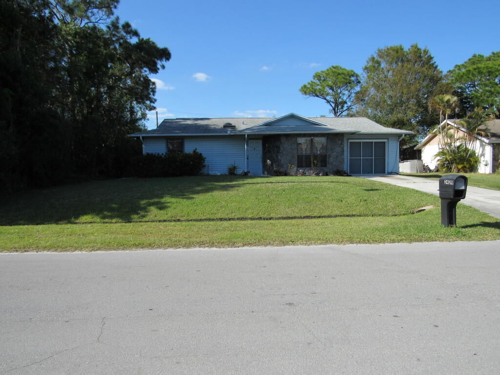 Property Photo:  2429 SW Falcon Circle  FL 34953 