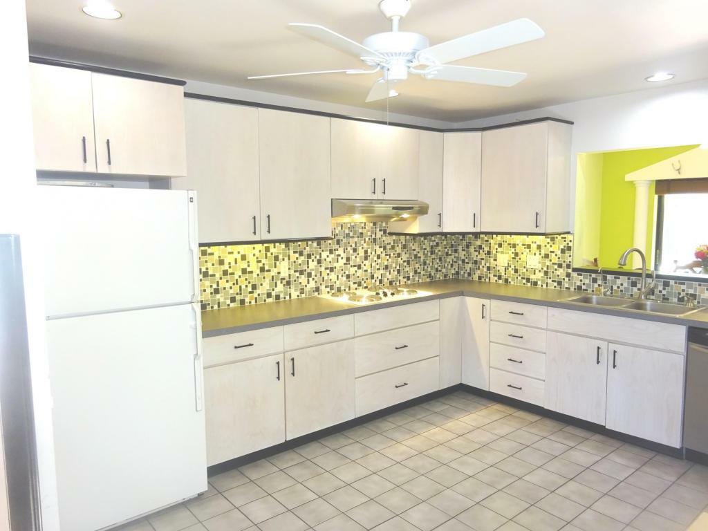 Property Photo: 408 NW 38th Way FL 33442