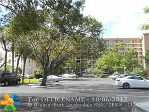 Property Photo:  2681 S Course Dr 808  FL 33069 