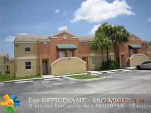 Property Photo: 2451 NW 56th Ave 1-203 FL 33313