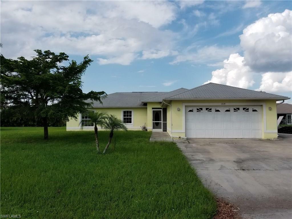 Property Photo: 1628 Cheshire Circle N FL 33936