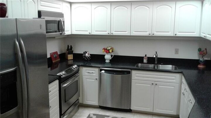 Property Photo:  1925 Gulf Of Mexico Drive G8-401  FL 34228 