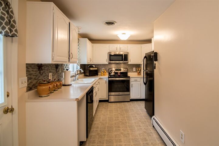 Property Photo:  13 Stonebridge Drive 13  NH 03865 