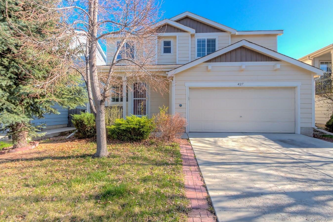 Property Photo: 4127 West Kenyon Avenue CO 80236