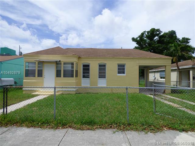 Property Photo: 1050 NW 49th St FL 33127
