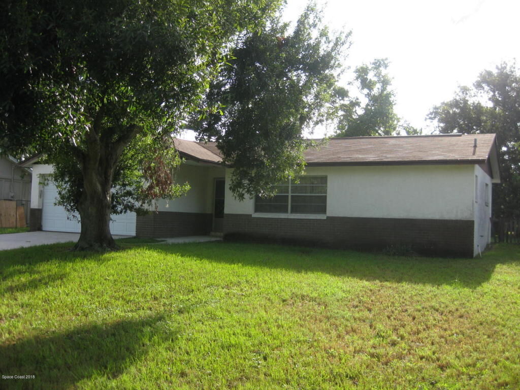 Property Photo:  6555 Orchid Avenue  FL 32927 