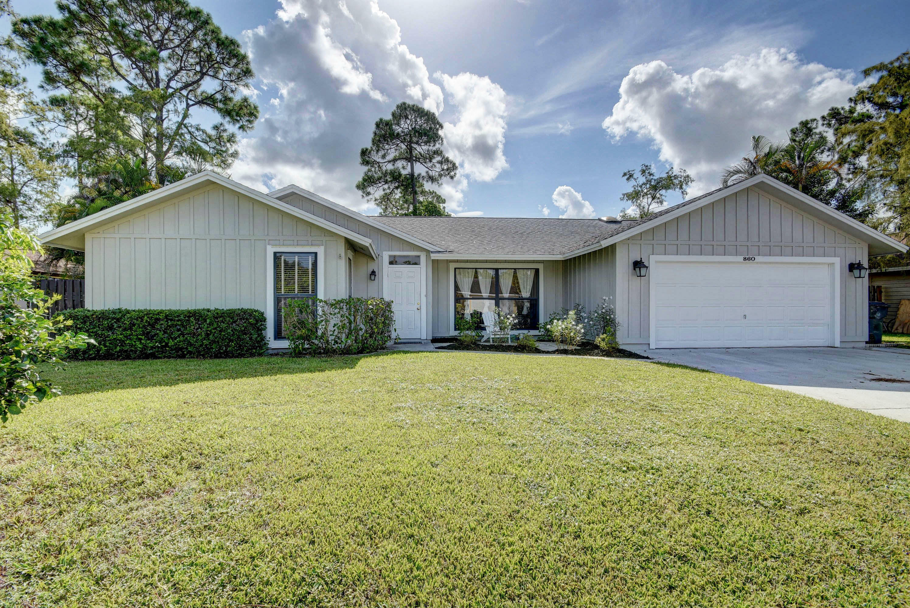 Property Photo:  860 Daffodil Drive  FL 33414 