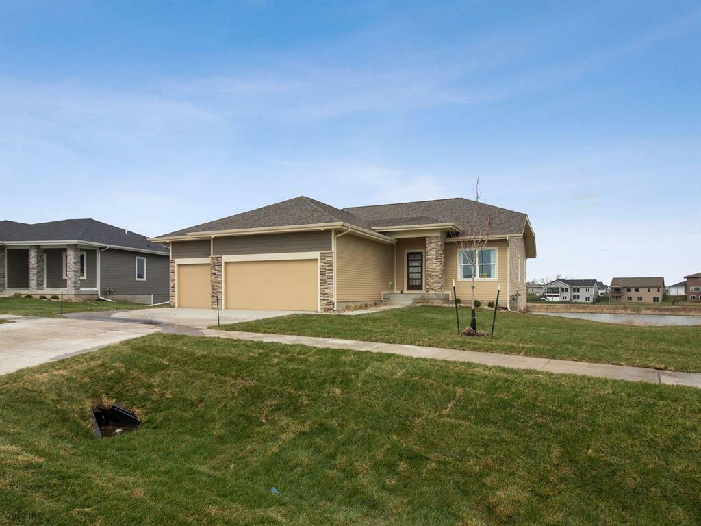 Property Photo:  7724 NW 95th Court  IA 50131 