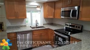 Property Photo:  451 SE 1st Ave B  FL 33060 