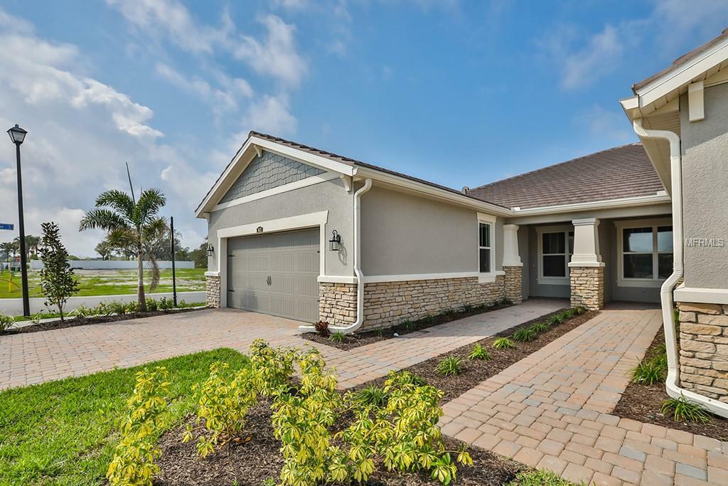 Property Photo:  8673 Rain Song Road 332  FL 34238 