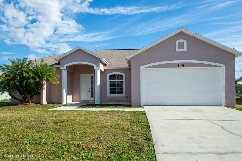 Property Photo:  549 SW Aster Road  FL 34953 