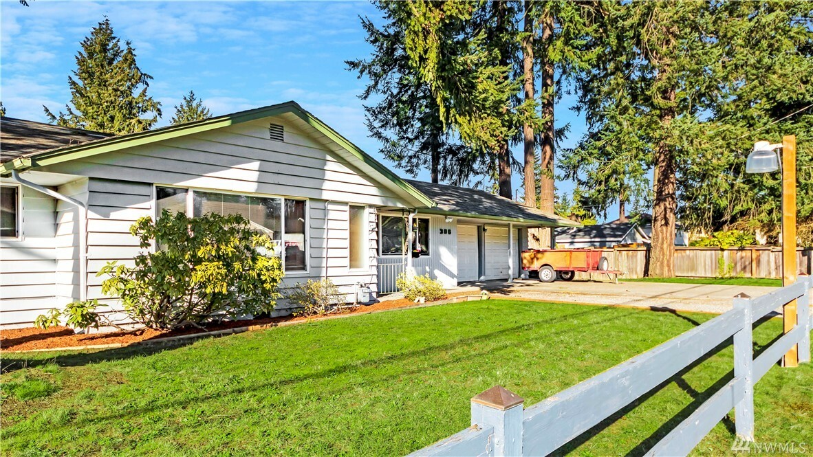 Property Photo:  306 S 206th St  WA 98198 