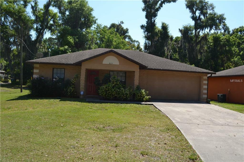 Property Photo:  864 E Voorhis Avenue  FL 32724 