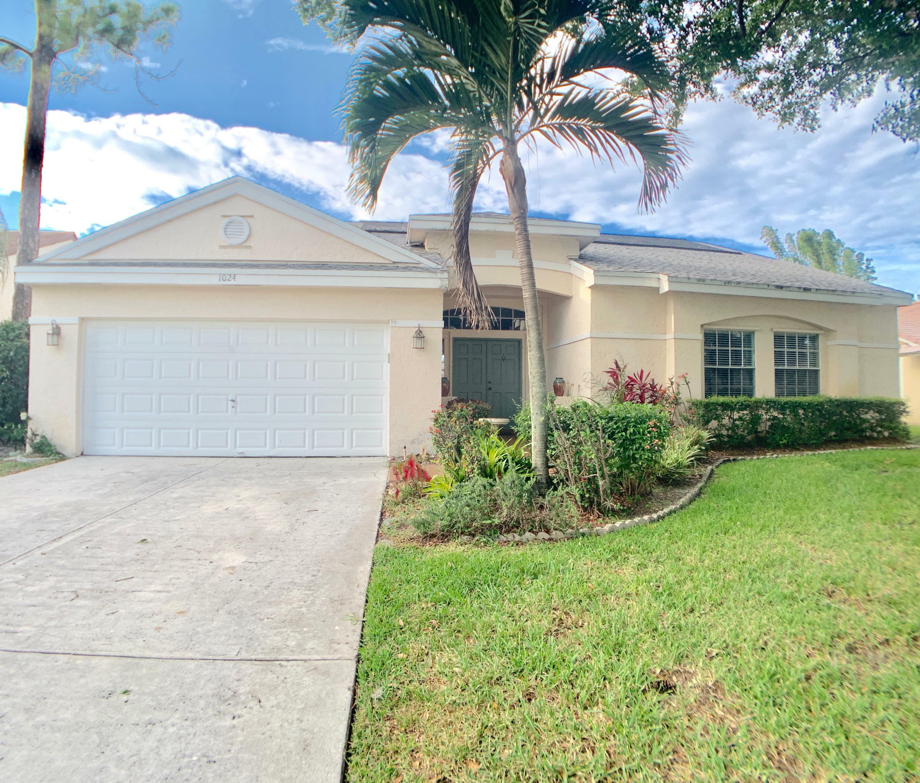 Property Photo:  1024 Lake Breeze Drive  FL 33414 