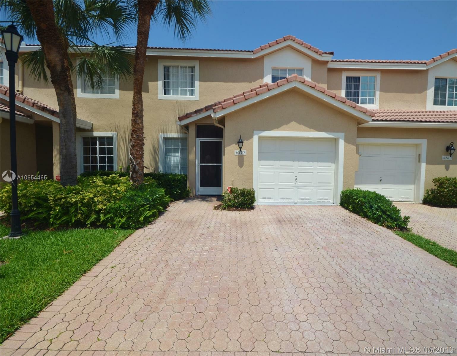 Property Photo:  6243 NW 74th Ct  FL 33067 