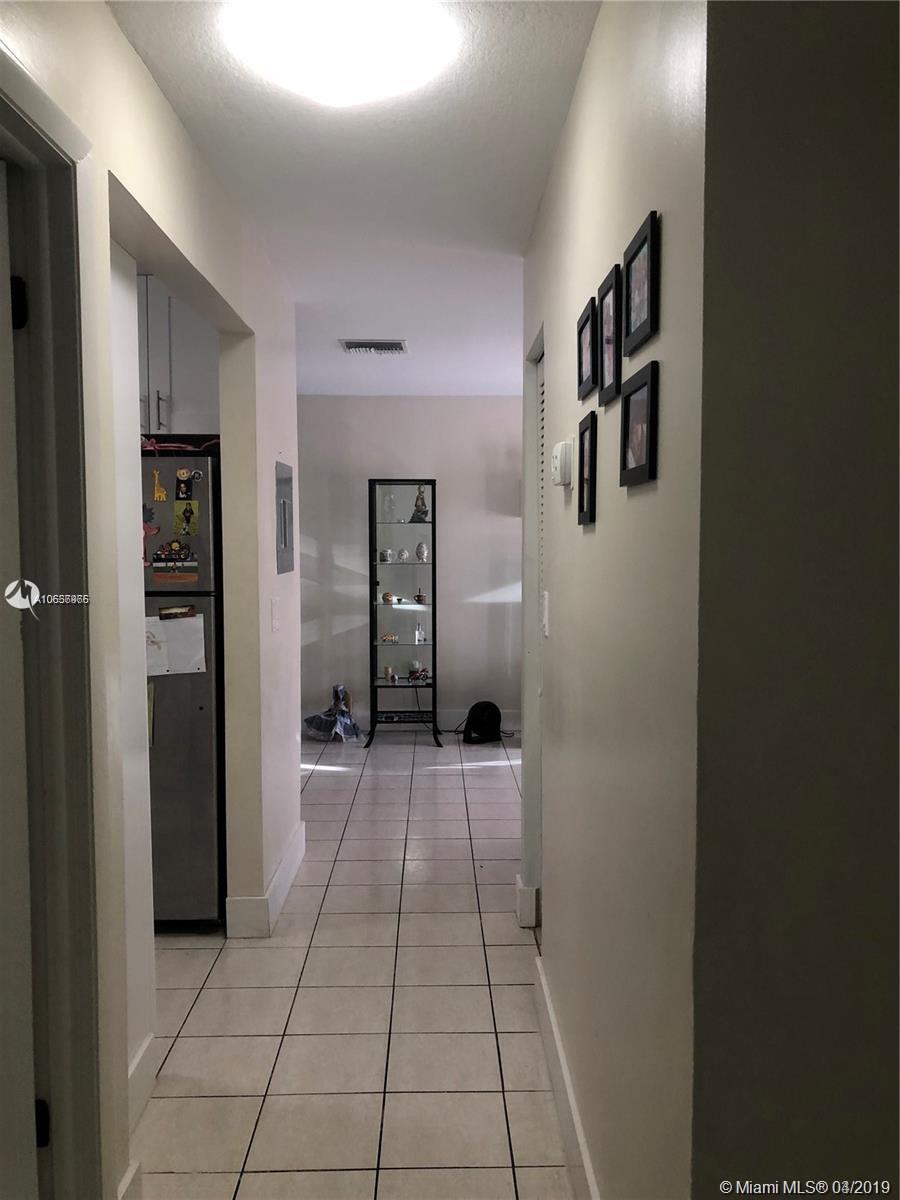 Property Photo:  13810 SW 112th St 201  FL 33186 