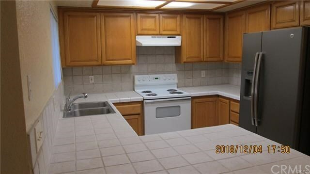 Property Photo:  16581 Grunion 1  CA 92649 