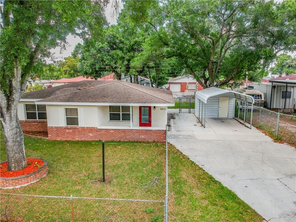 Property Photo:  3819 W Sligh Avenue  FL 33614 