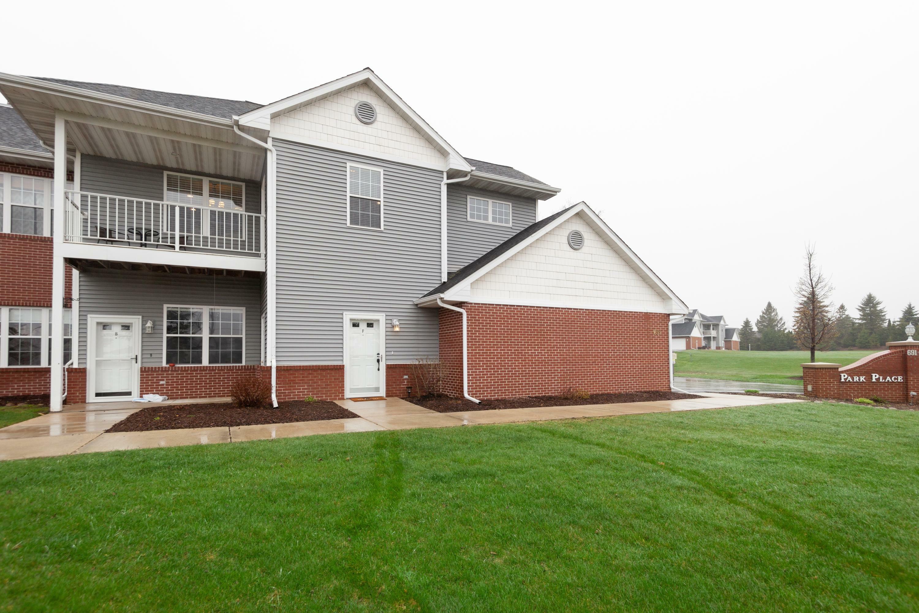 Property Photo:  691 W Dekora St F  WI 53080 