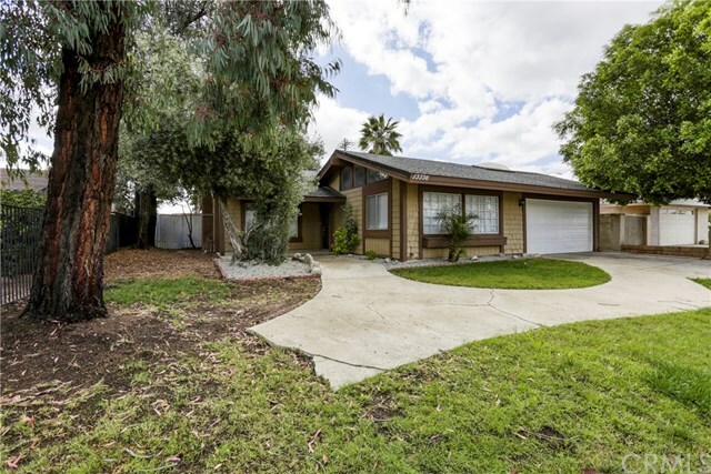 Property Photo:  13736 Persimmon Road  CA 92553 