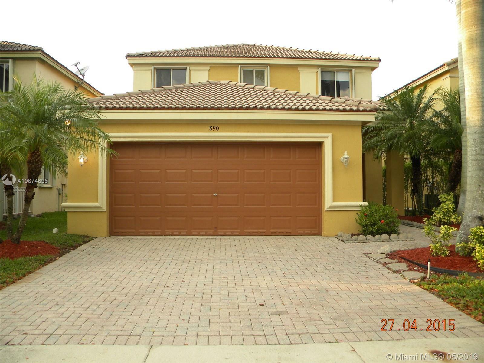 Property Photo:  890 Golden Cane Dr  FL 33327 