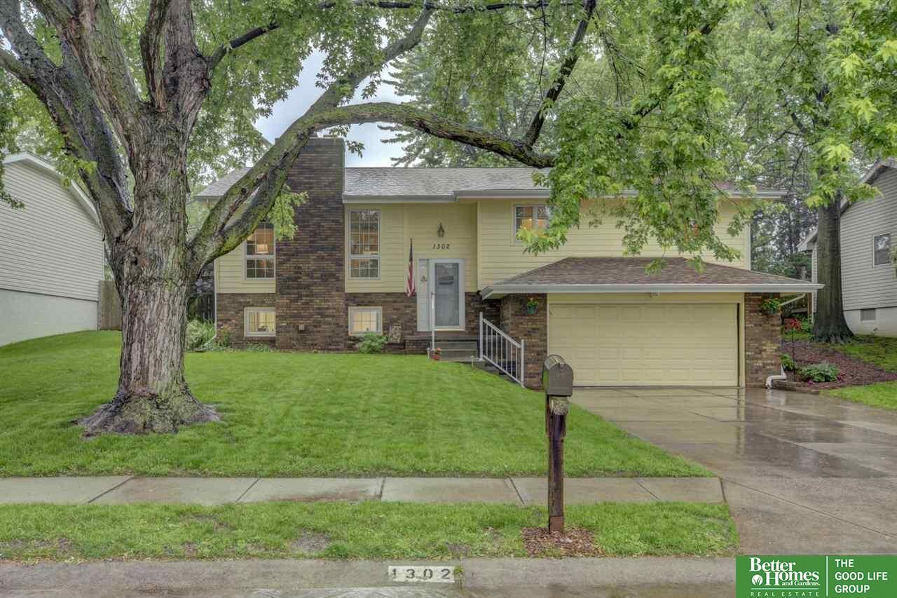 Property Photo: 1302 Cedarwoods NE 68046