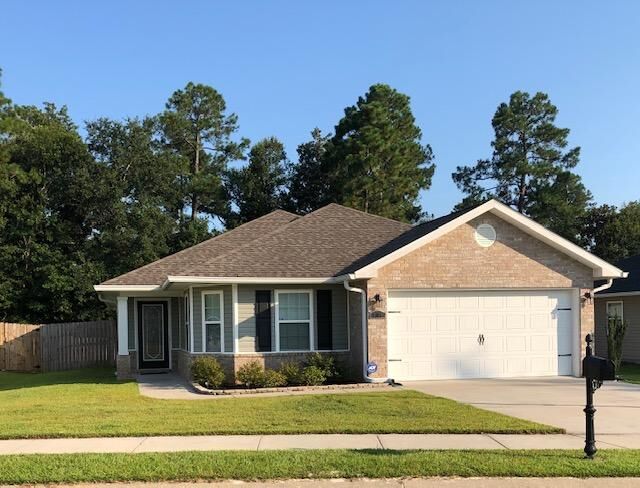 Property Photo:  5085 Carley Court  FL 32583 