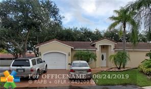 Property Photo:  6060 NW 42nd Way  FL 33073 