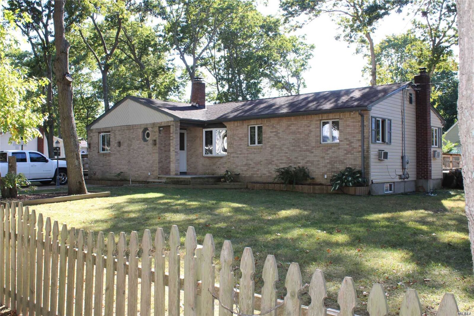 Property Photo: 66 Poospatuck Lane NY 11950