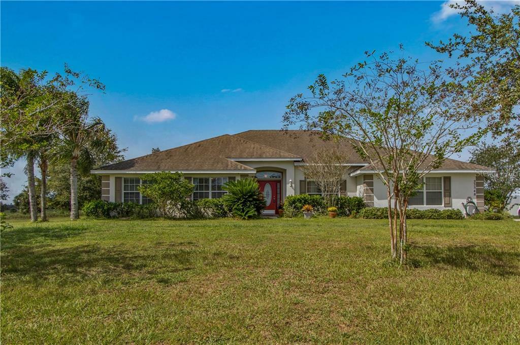 Property Photo:  23548 Milford Drive  FL 32736 