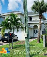 Property Photo:  305 NE 35th Ct  FL 33334 