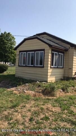 Property Photo:  4207 Aurelius Road  MI 48910 