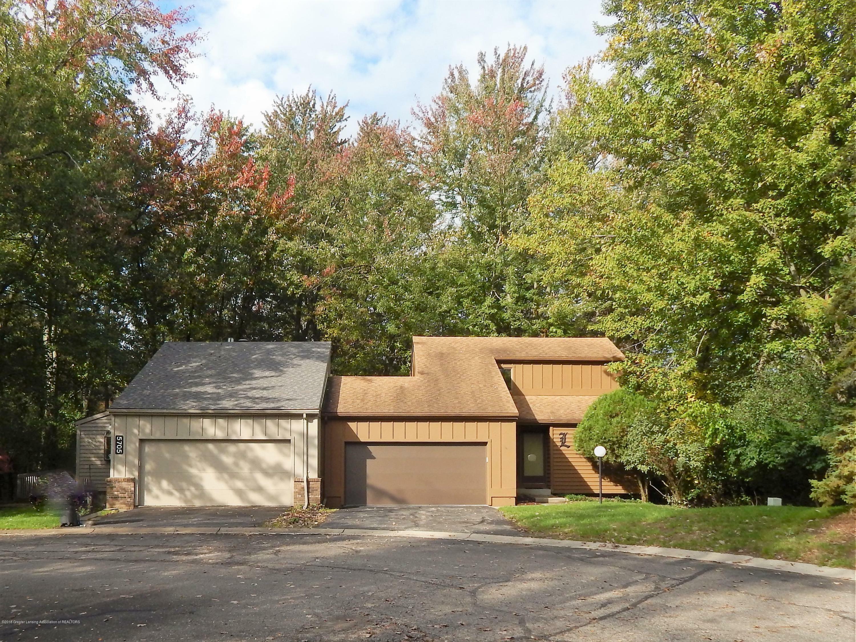 Property Photo:  5707 Paige Court  MI 48823 