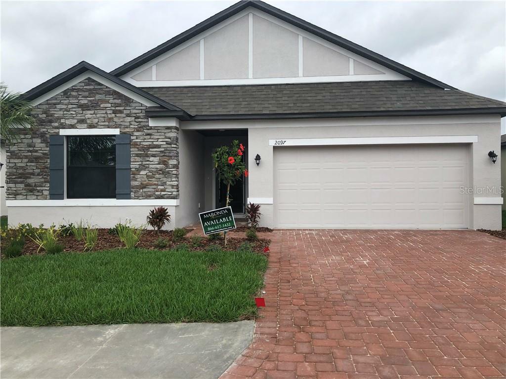 Property Photo: 2097 Apian Way FL 33953