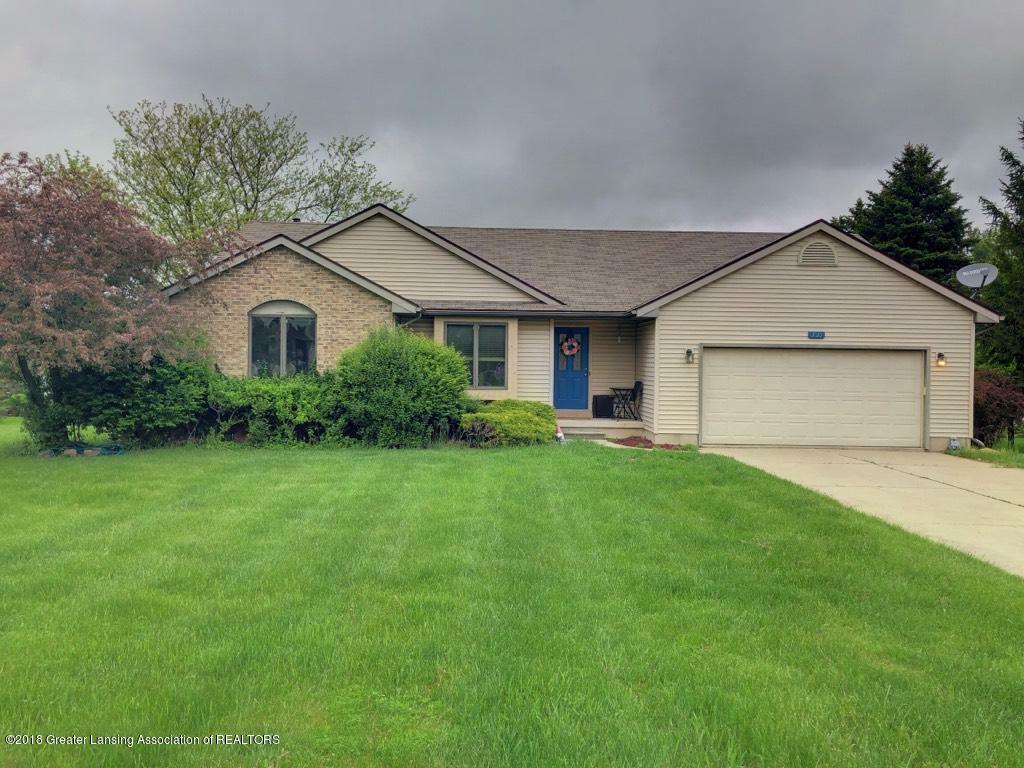 Property Photo: 305 E Herbison Drive MI 48820