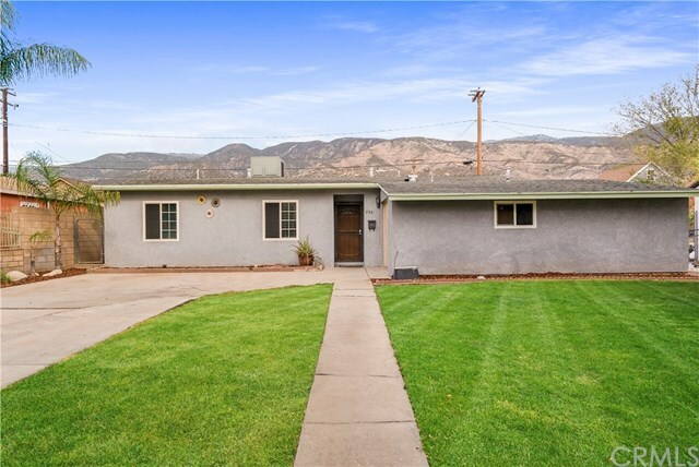 Property Photo:  396 W 48th Street  CA 92407 