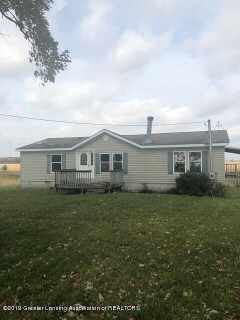 Property Photo:  11976 Harwood Road  MI 48849 