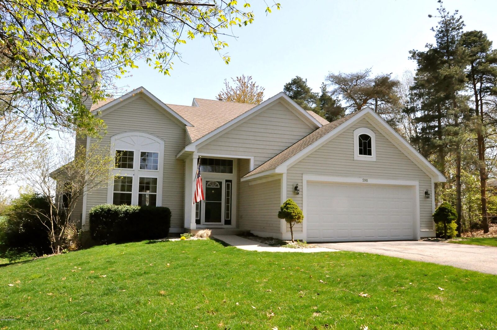 Property Photo:  5911 Preservation Drive  MI 49419 