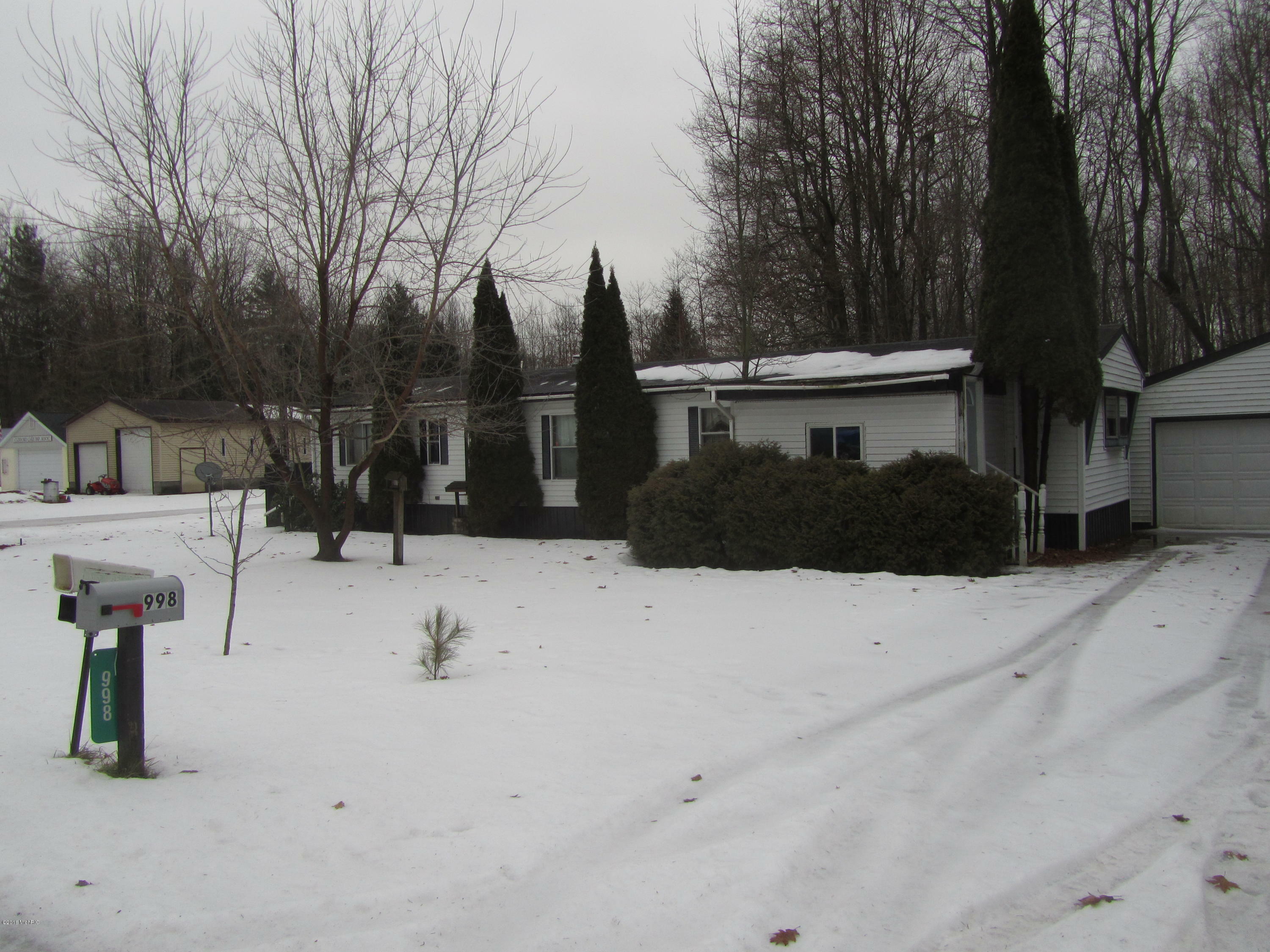 Property Photo:  998 Clifford Lake Drive NW  MI 48888 